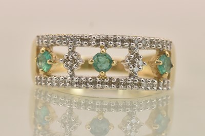 Lot 1285 - A 9ct yellow gold modern style diamond and...