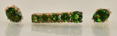 Lot 1376 - A pair of oval cut chrome diopside deep green...