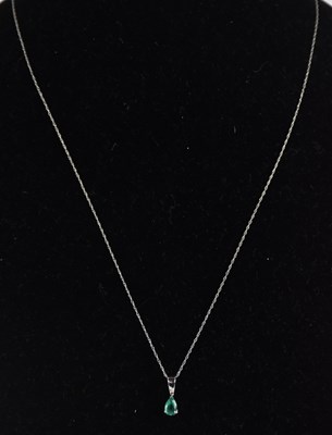 Lot 1356 - A 9ct white gold dainty necklace with ring...