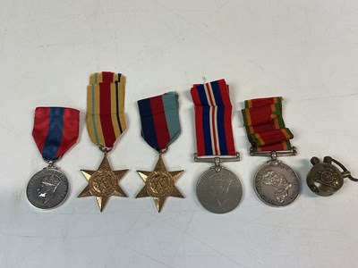 Lot 100 - A WWII medal group comprising the Africa Star,...
