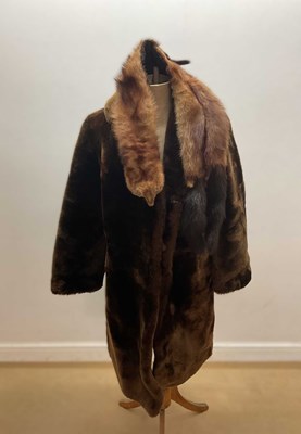 Lot 613 - A faux fur coat and mink stole, size and...