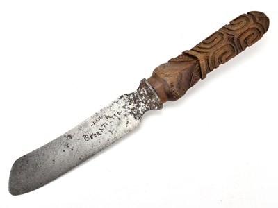 Lot 1047 - A carved Maori ceremonial spear tip (Taiaha)...