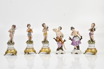 Lot 1275 - Four Continental porcelain figures of cherubs,...