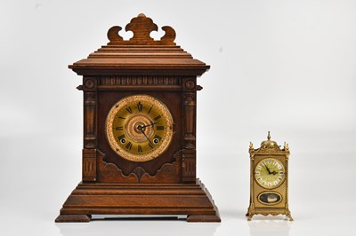 Lot 360 - An oak cased mantel clock, with gilt painted...