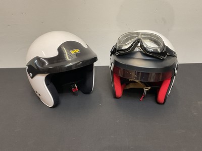 Lot 4 - A OMP helmet, together with a Sparco example.