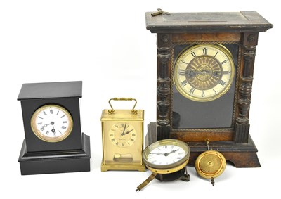 Lot 228 - A 19th century black painted mantel clock with...