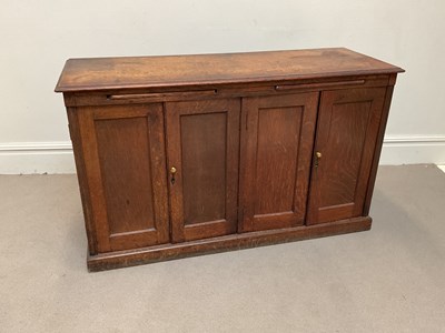 Lot 193 - A 19th century oak sideboard with four...
