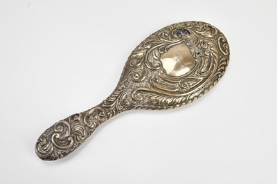 Lot 233 - An Edward VII hallmarked silver hand mirror,...