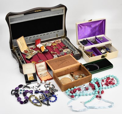Lot 704 - A collection of costume jewellery including...