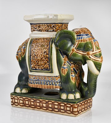 Lot 1298 - A ceramic elephant stool, height 52cm.