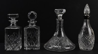 Lot 1235 - A group of cut glass decanters, including a...