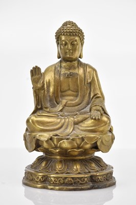 Lot 1650 - A gilt bronze Buddha