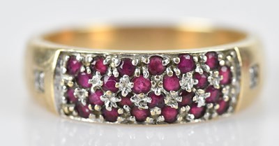 Lot 576 - A 9ct yellow gold diamond set dress ring, set...