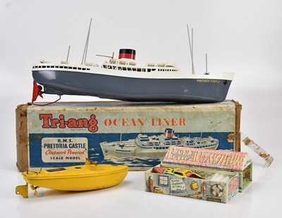 Lot 2112 - TRI-ANG; a boxed ocean liner, a Sutcliffe wind-...