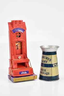 Lot 521 - CADBURY; a chocolate dispenser, a tin...