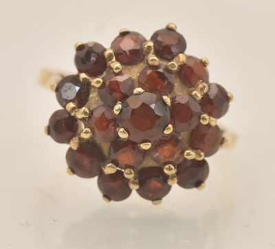 Lot 1271 - A 9ct yellow gold garnet set cluster ring, set...