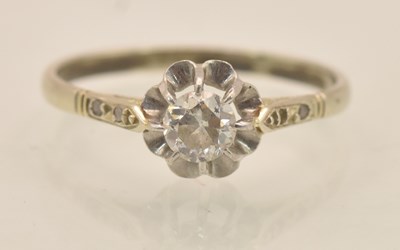 Lot 1254 - A white metal diamond solitaire ring, the...