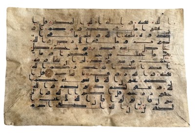 Lot 1003 - A large Islamic Quran Kufic page on vellum, 42...