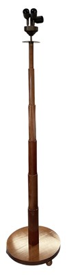 Lot 133 - A modern turned wooden veneered table lamp of...