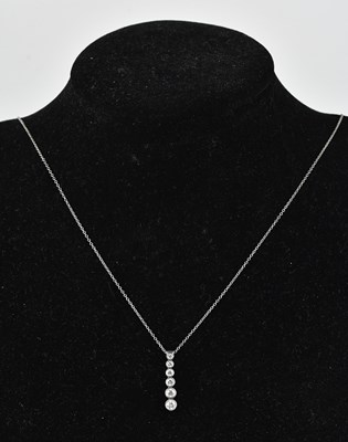 Lot 242 - TIFFANY & CO; a platinum diamond six stone...