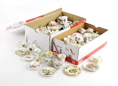 Lot 1340 - A collection of miniature cups and saucers...