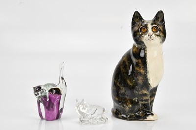 Lot 1399 - WINSTANLEY; a ceramic cat with glass eyes,...