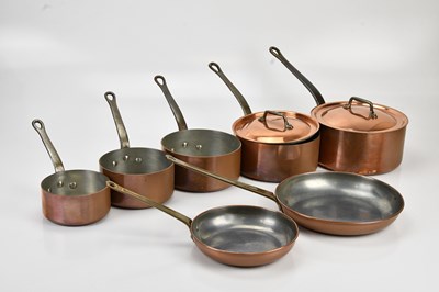 Lot 585 - A set of five tin lined copper pans, two with...