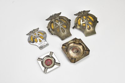 Lot 558 - A group of three AA car badges, and two...
