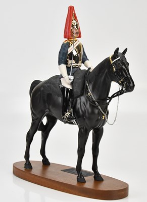Lot 1243 - BESWICK; a 'The Blues and Royals' figure, on...