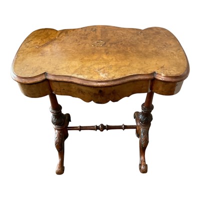 Lot 171 - A 19th century walnut sewing table, with...