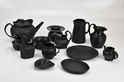 Lot 1327 - WEDGWOOD; a collection of black basalt, with...
