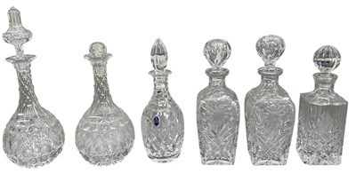 Lot 648 - Six cut and crystal glass decanters, including...