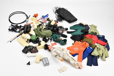 Lot 2150 - An Action Man doll with various clothes and...