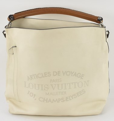 Lot 453 - LOUIS VUITTON; a cream leather 'Bagatelle'...