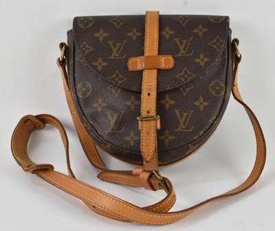 Lot 456 - LOUIS VUITTON; a vintage brown and tan leather...