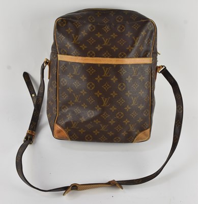 Lot 458 - LOUIS VUITTON; a vintage brown and tan leather...