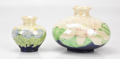 Lot 382 - LISE B. MOORCROFT; two lustre vases including...
