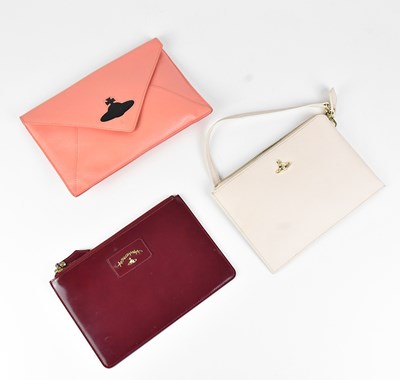 Lot 1295 - VIVIENNE WESTWOOD; a coral pebbled leather...