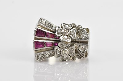 Lot 389 - An Art Deco diamond and ruby floral dress ring,...