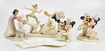 Lot 1251 - LENOX; four Disney figures comprising 'Let's...