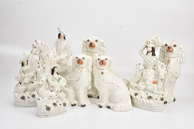 Lot 1274 - STAFFORDSHIRE; four spaniels, height of...