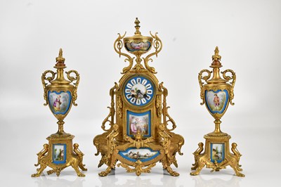 Lot 326 - A late 19th century ormolu and porcelain three...