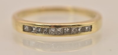 Lot 1262 - A 9ct yellow gold diamond ten stone ring, set...