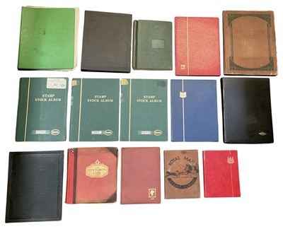 Lot 439 - Fourteen albums of assorted all world stamps,...