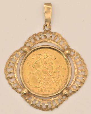 Lot 1306 - A George V full sovereign, 1929, in 9ct yellow...