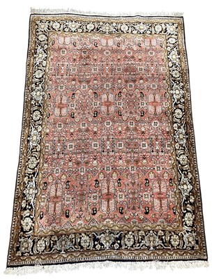 Lot 125 - A hand woven silk and woollen ground Iranian...