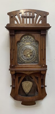 Lot 381 - A German Art Nouveau walnut wall clock, with...