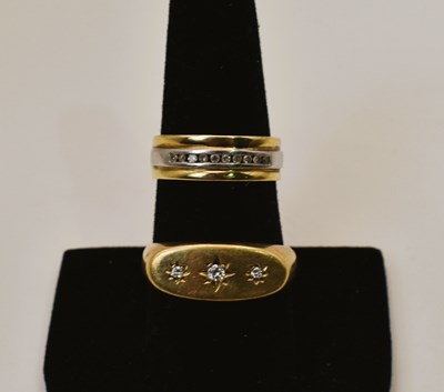 Lot 530 - Two 9ct gold band rings, comprising a band...