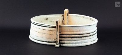 Lot 283 - JOHN HIGGINS (born 1947); an oval earthenware...