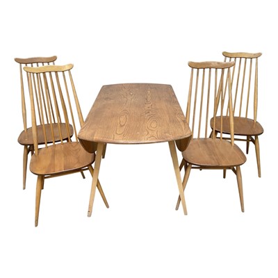 Lot 10 - ERCOL; an elm drop-leaf table, height 70cm,...
